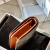 Triomphe compact wallet in shiny calfskin brown monogram