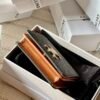 Triomphe compact wallet in shiny calfskin brown monogram