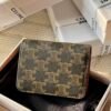 Triomphe compact wallet in shiny calfskin brown monogram