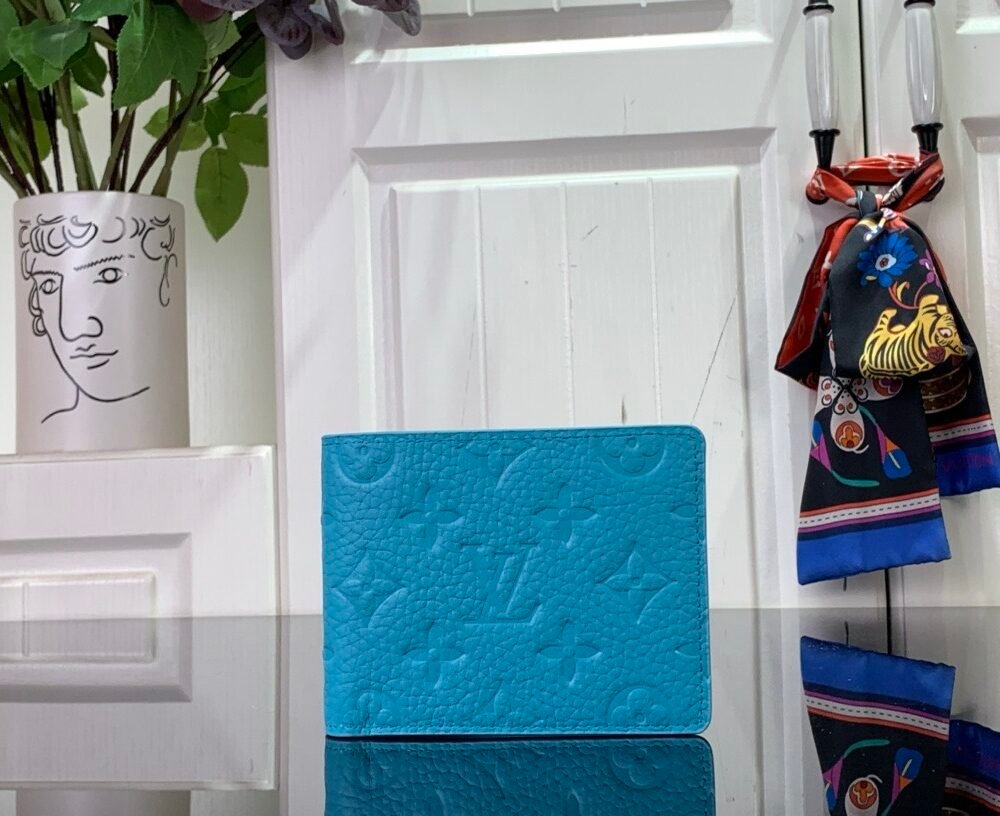 LV [Multiple short wallet] light blue (embossed)