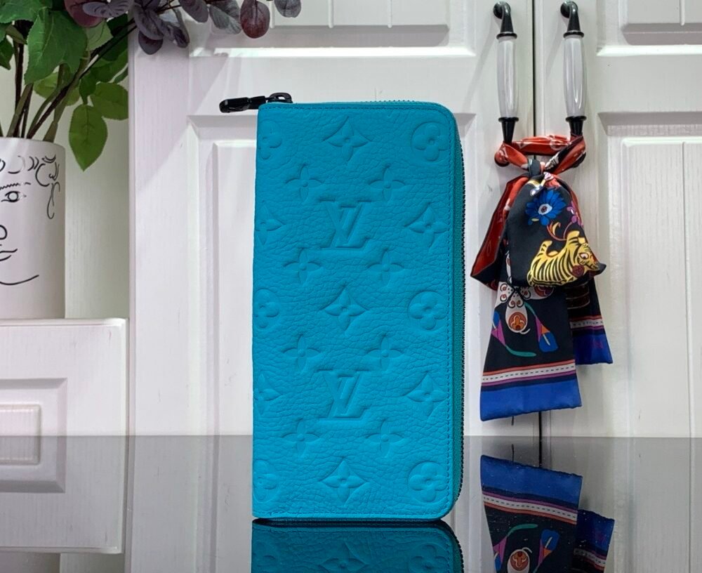 LV light blue (embossed) zippy wallet card holder wallet